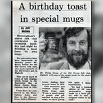 A birthday toast in special mugs